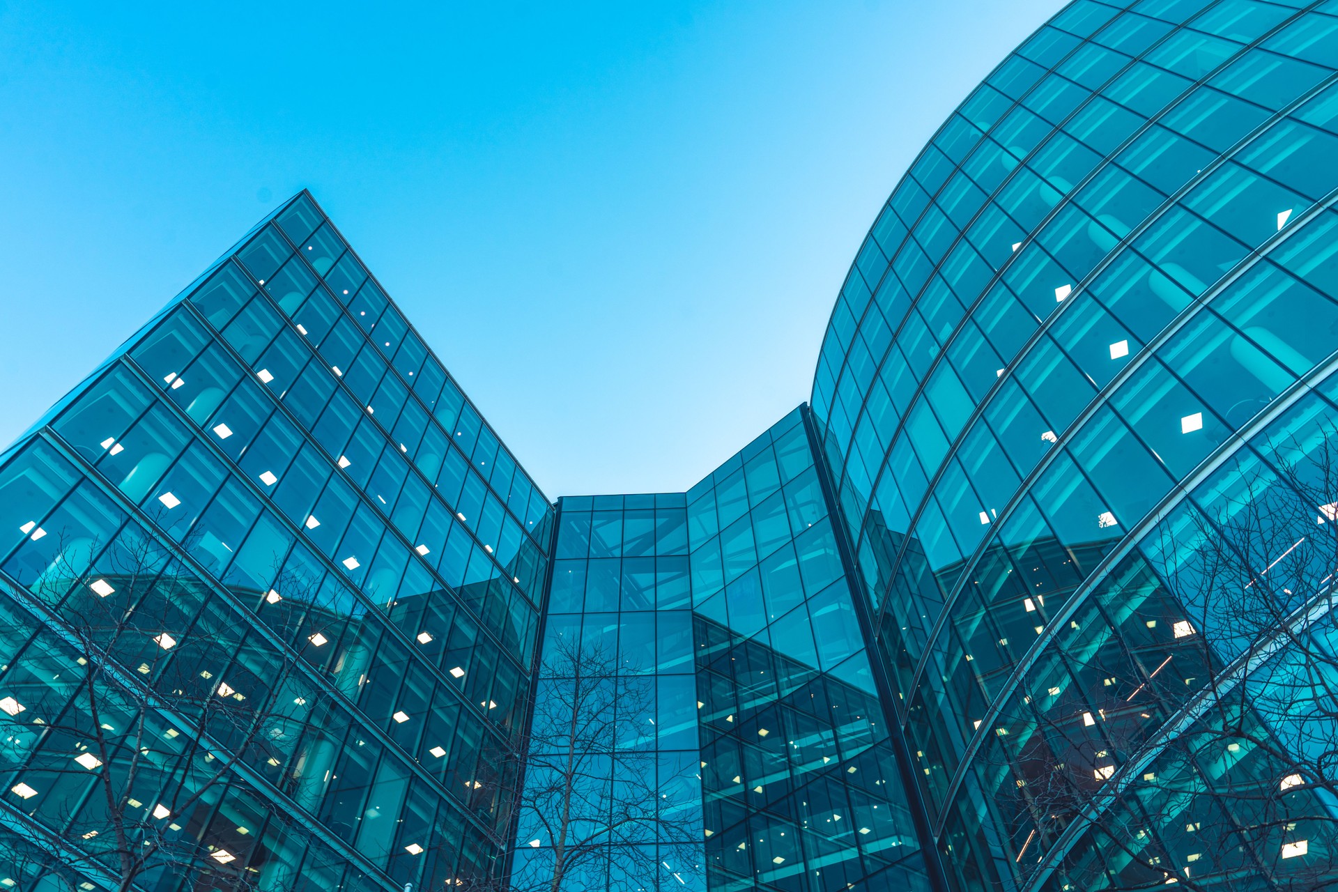 Looking directly up at the skyline of the financial district in central London